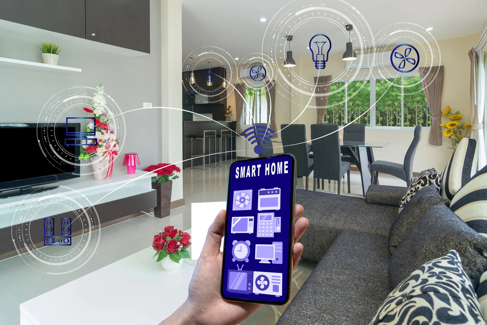 smart-home-and-augmented-reality-technology-concept--hand-holding-smart-phone-presenting-the-smart-home-control-screen-and-icon-over-the-luxury-living-room-1766998576120.webp